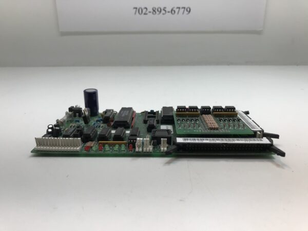 A PGI Smart Interface Board- Mikohn104 with an electronic component on it.