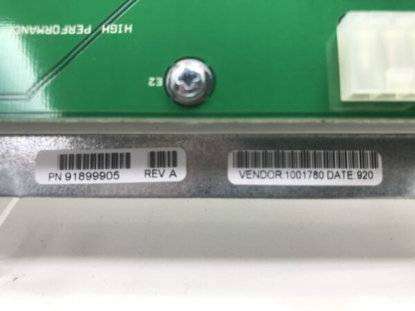 A green IGT AVP Mother Board Unit with a bar code attached to it.