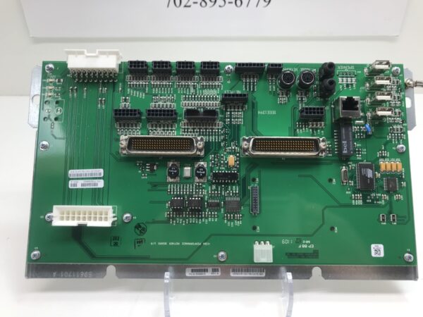 A green IGT AVP Mother Board Unit with a number of electronic components on it.