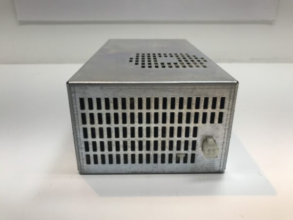 A small WMS BBI Power Supply sitting on a white surface.