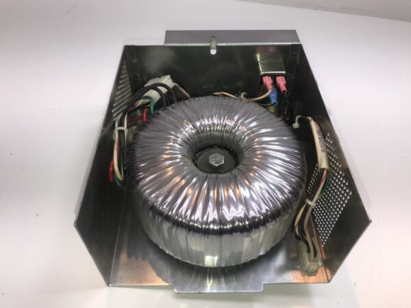 A metal box with a WMS BBI 24V Power Supply. OLD SCHOOL DONUT style. This is Original Part W2187386. GETT part PSUP189 inside.