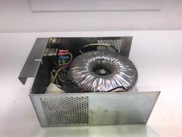 A metal box with a WMS BBI 24V Power Supply. OLD SCHOOL DONUT style. This is Original Part W2187386. GETT part PSUP189 inside.