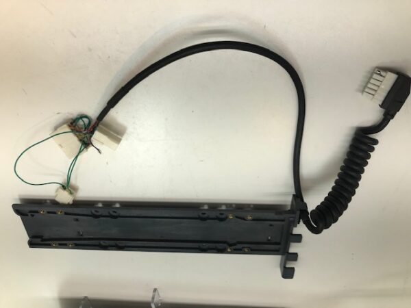 A Gen 2 Printer Harness and "Home" slide in assembly unit with a wire attached to it.