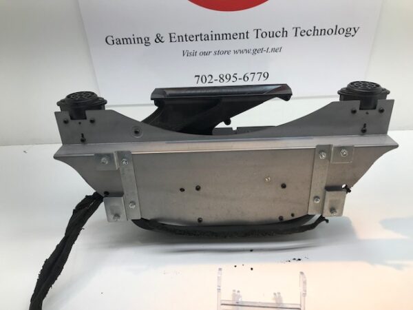 A gaming console with a WMS BBII Speaker Assembly Part #309736-0010 attached to it.