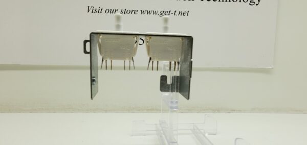 A display of the IGT TrimLine Door Switch. Double 10A switch with Metal bracket housing. GETT Part Switch 115 with a label on it.