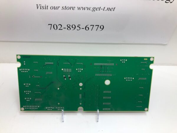 A green pcb board with a logo on it.