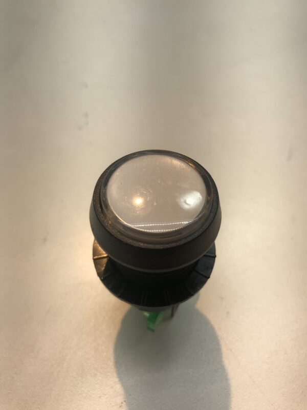 A Small OEM/ VLT Button with a green light on it.