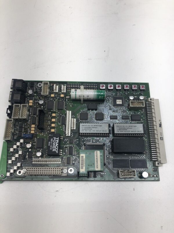 An Atronic E-Motion Comm' Board with a chip on it.