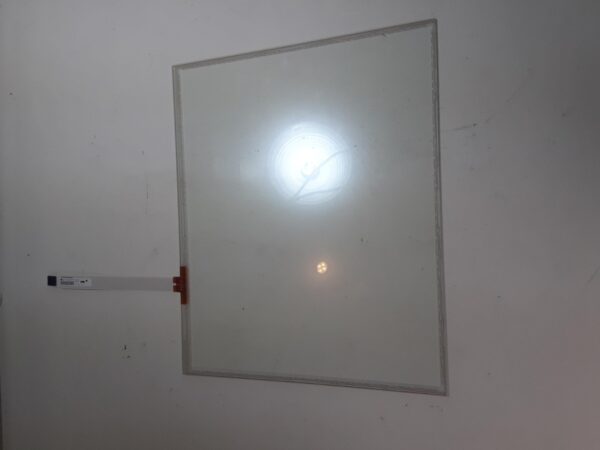 A white wall with a 17.54" Ino Touch Sensor shining on it.