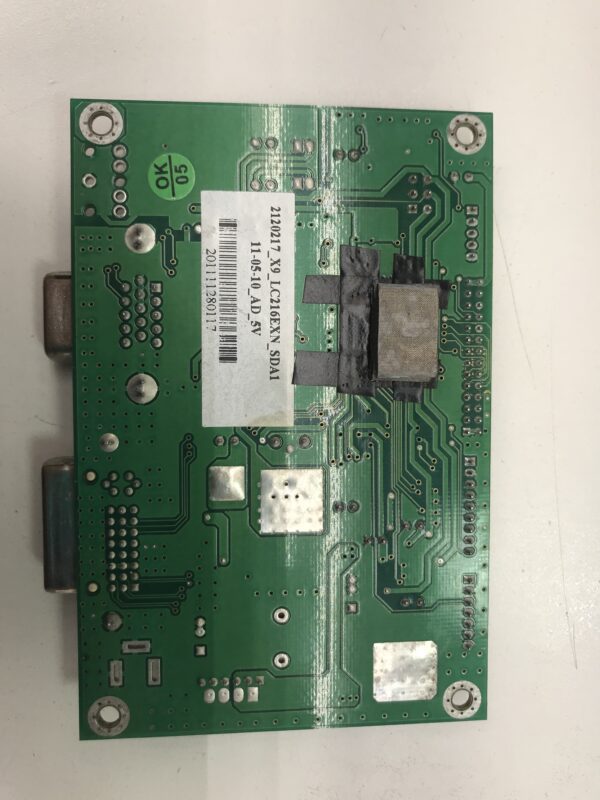 A green IGT 20" MLD LCD Monitor A-D Board with a chip on it.