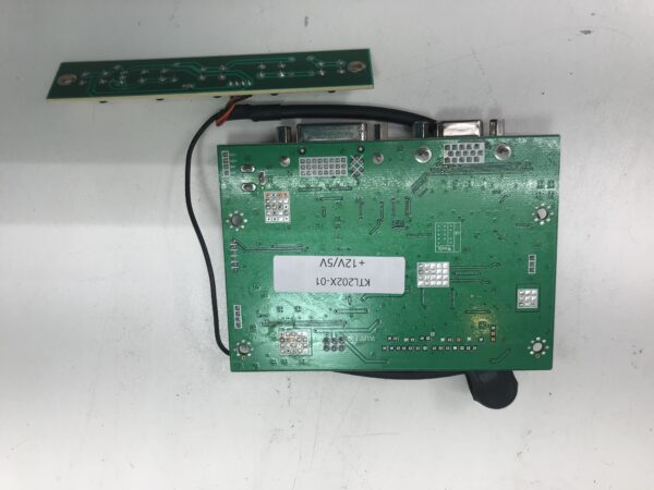A green IGT 20" MLD LCD Monitor A-D Board with a wire attached to it.