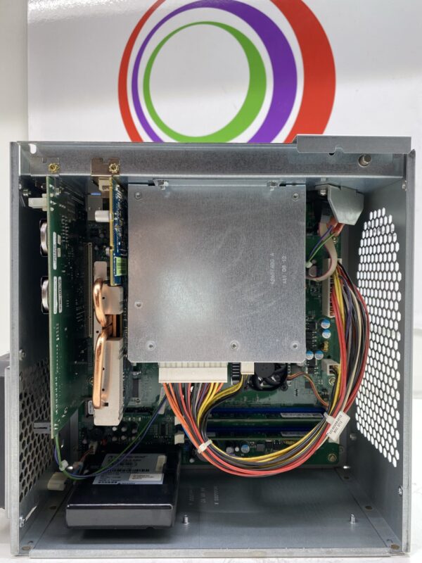 The inside of a computer case with an IGT AVP 3.0 660 CPU, TURION 2.1 GHZ, 2GB RAM, Complete, 50066000W. GETT Part CPU168 and wires.