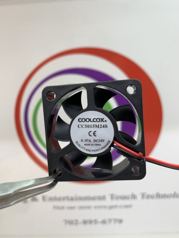 A small Cooling Fan with a wire attached to it. CoolCox Brand- Part # CC5015M24S. 24v x .07A. 2-Wire, no connector plug/ wire only. GETT Part Fan153