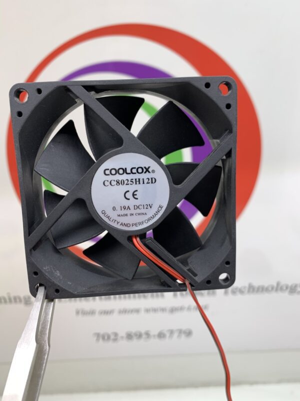 A Cooling FAN, CoolCox Brand with a wire attached to it.