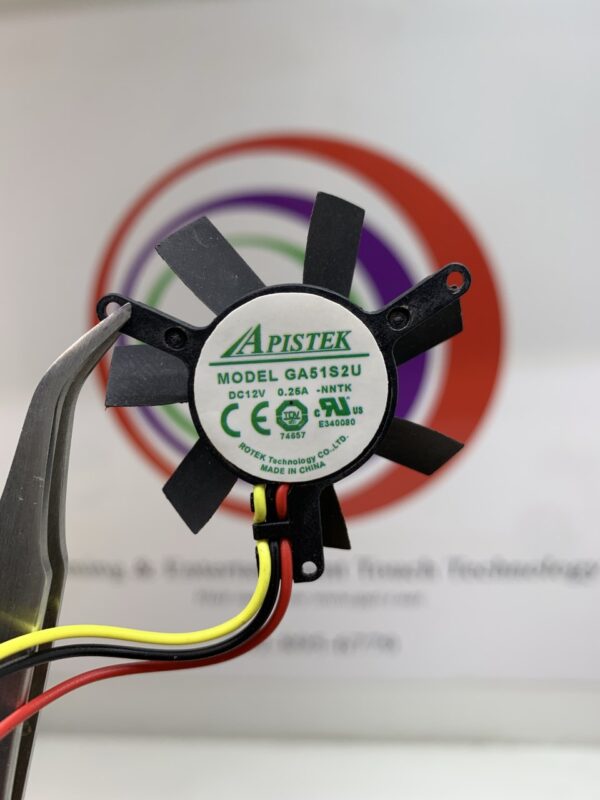 A Cooling Fan with wires attached to it.