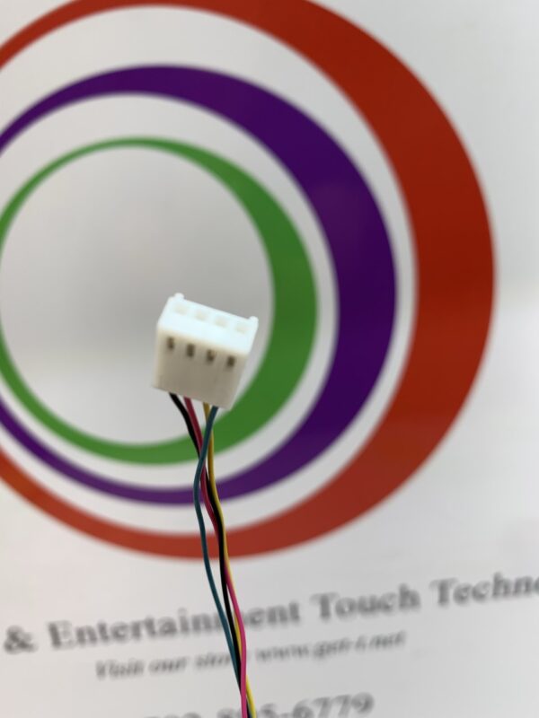 A wire connected to a Cooling Fan that says entertainment touch technology.