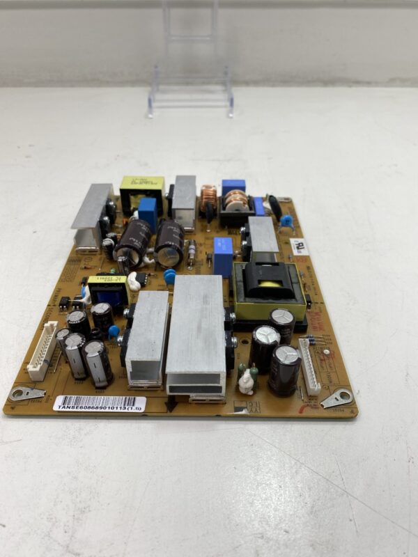 A LG 32" 32LD350-UB 32LD450-UA EAY60868901 Power Supply Board Motherboard. Part TANSE608689010113 is on a table.