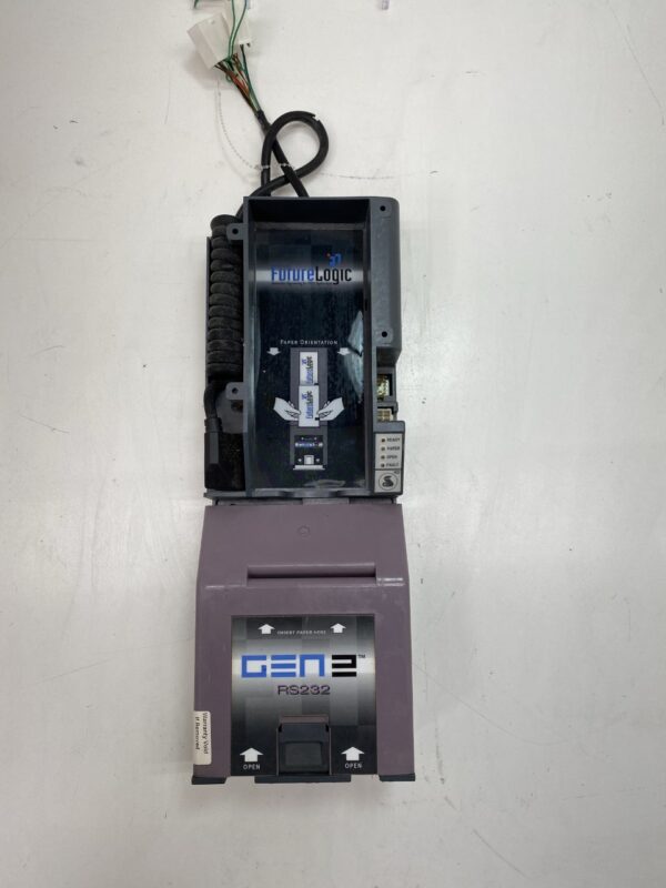 A machine with a Future Logic GEN 2 Netplex Printer (Non Universal) attached to it.