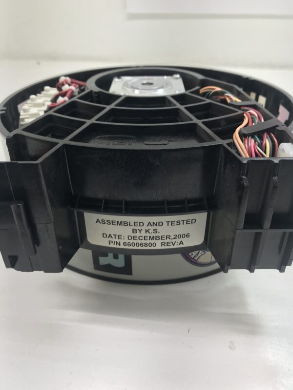 A Reel Assembly for IGT AVP Game with wires attached to it.
