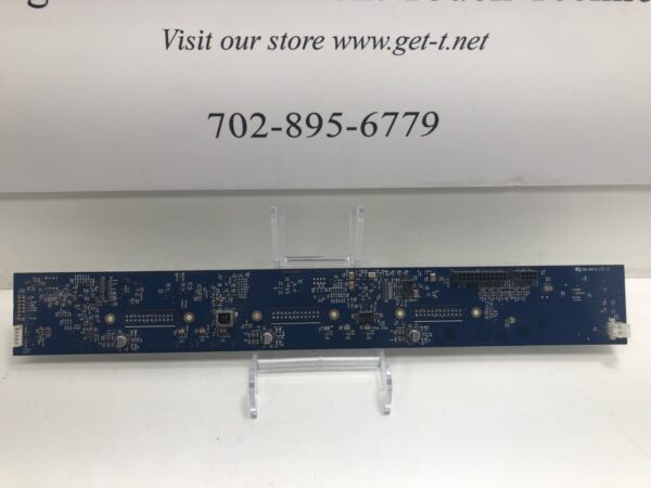 A blue IGT Reel Driver Board for use with IGT AVP Reel Games, Others with a sign on it.