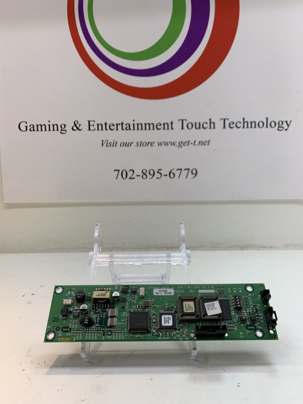 A VFD (Vacuum Formed Display) for use with IGT Games board in front of a sign.