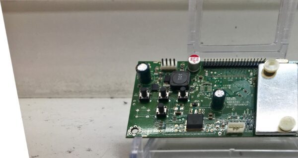 A small A-D Board for Kristel LCD Touch Monitors with a chip on it.