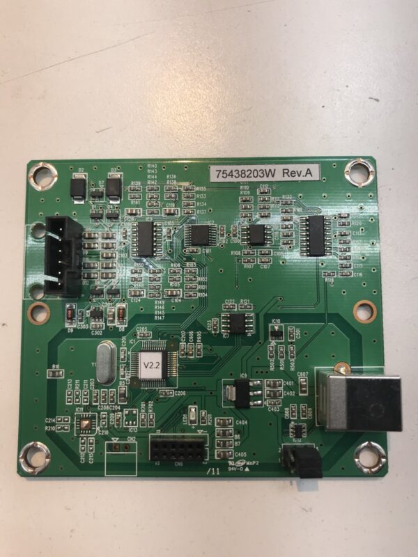 A green SCT Touch Controller, DigiTech Brand pcb board on a table.