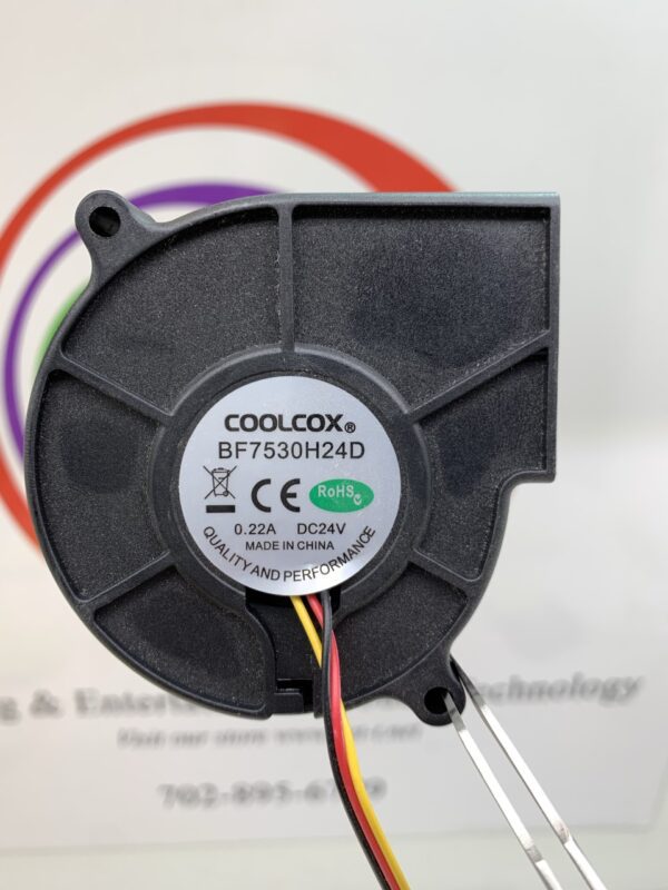 A CoolCox Brand Cooling Fan with wires attached to it.