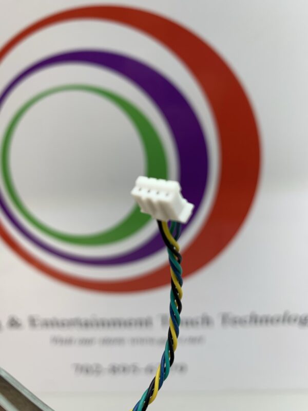 A wire connected to a computer with a Cooling Fan, Frameless, Power Logic Brand- Part # PLD05010S12H. 12v x .20A. 3-Wire with Connector Plug. GETT Part Fan128 on it.