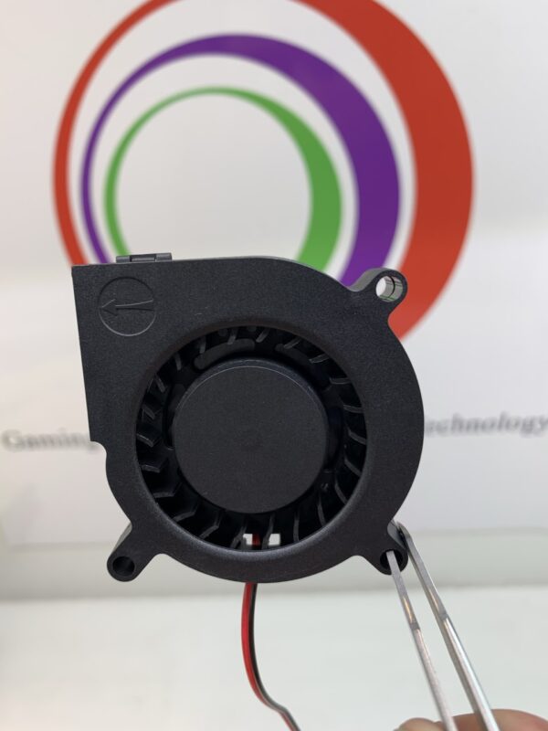 A hand holding a Cooling FAN,COOLCOX Brand- Part # BF6015H12D.12V x .25A ,2-WIRE,40X40X20MM,W/CONNECTOR. GETT Part Fan130 with wires attached to it.