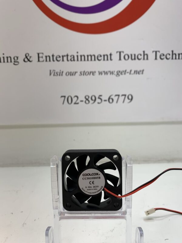 A small fan with a logo on it.