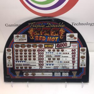 A slot machine with an IGT Double Diamond Belly Glass. 20.25" x 9.5". GETT Part BellyGlass100 logo on it.
