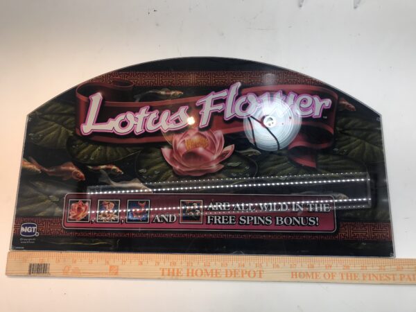 A lotus flower sign with a IGT Double Diamond Belly Glass. 20.25" x 9.5". GETT Part BellyGlass100 on it.