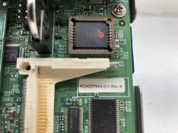 A close up of a Bally I View 3.0 controller with a chip on it.