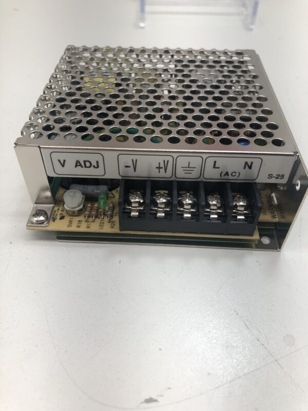 A small 12V Power Supply for use with PalTronics Progressive Jackpot Systems and Related parts on a table. MW brand, Part # S-25-12. GETT Part PAL107.