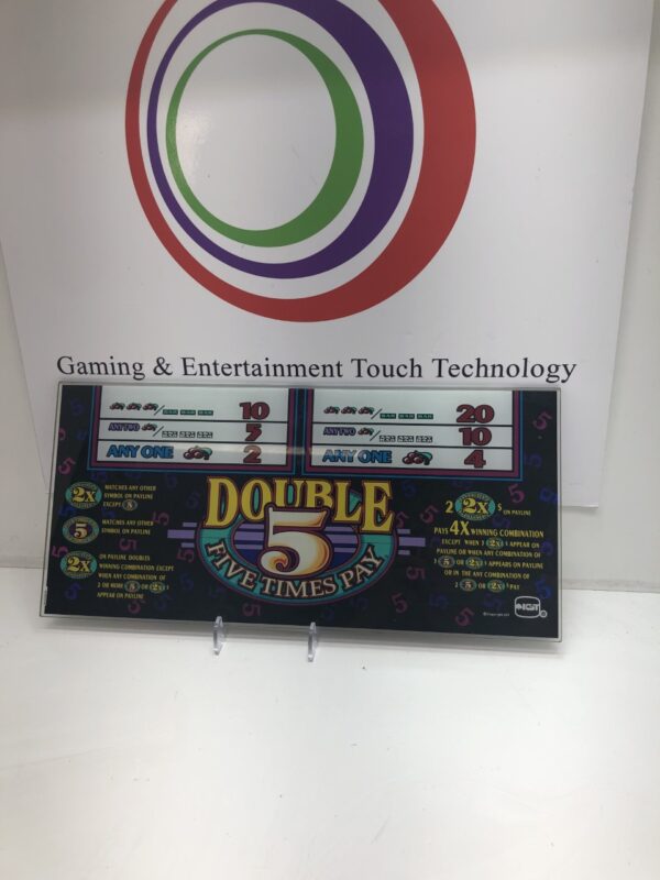 A Belly Glass for IGT S2000 Double 5 Times Pay with a sign that says gaming and entertainment touch technology.