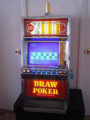 A slot machine with the Top Glass for IGT 9" top Video Poker Game. Top Glass PayTable, Draw Poker on it. Great for Use in Man Cave! GETT Part TopGlass132.