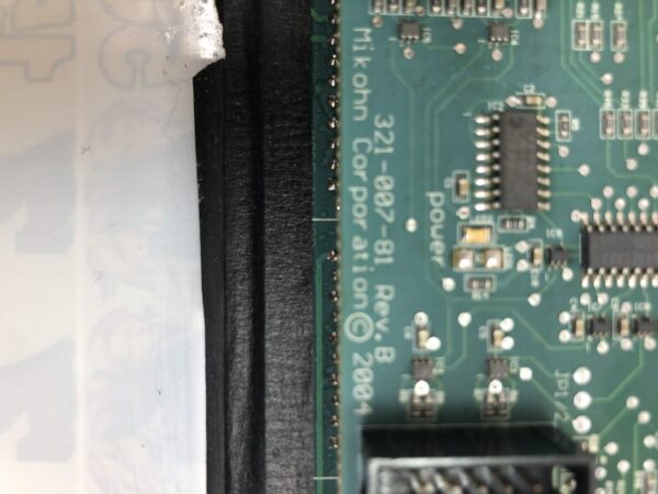 A close up of a pcb with the TopGlass140 on it.