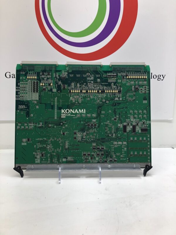 A Konami Game Board GG9P1-us With Diamond Solitaire Deluxe Software installed with a logo on it.
