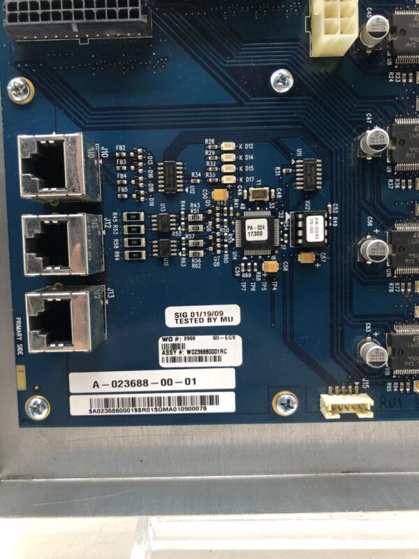 A close up of a blue WMS BBI, BBII Power Control, Reel Driver Board (WMS Part A-023688-00-01, GETT Part PCB115).