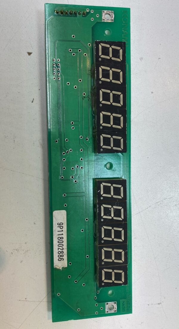 A Power Control Board for Konami Gaming, Konami Part GG9P1 Interface Buttons/Door/7 Segment Board. GETT Part PCB114 with a number of electronic devices on it.