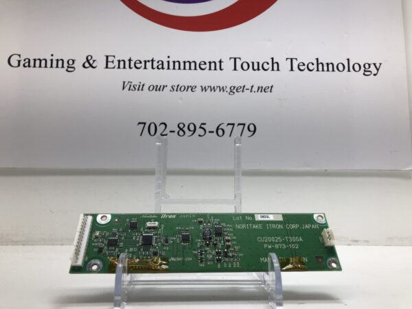 A gaming and entertainment technology board in front of a VFD for use with IGT and Bally Games. Noritake Brand, Noritake Part CU20025-T300A and GETT Part VFD105.