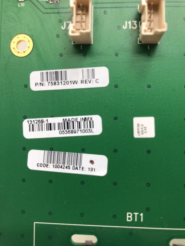 A close up of a green board with the MPU for IGT Trimline Games. IGT Part 75831201W. GETT Part MPU115 barcode on it.