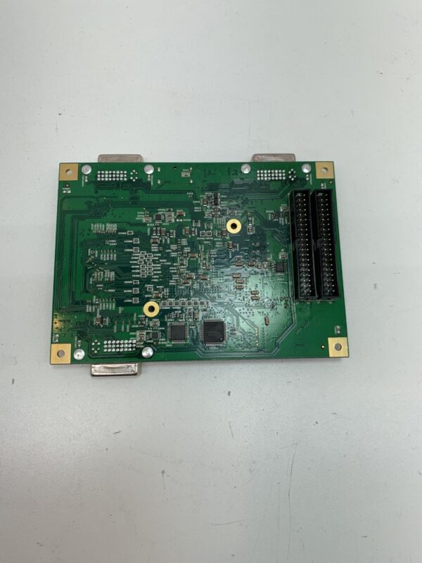 A green ADB Board for Bally Alpha I Games. Part # PCA221683 on a white surface.