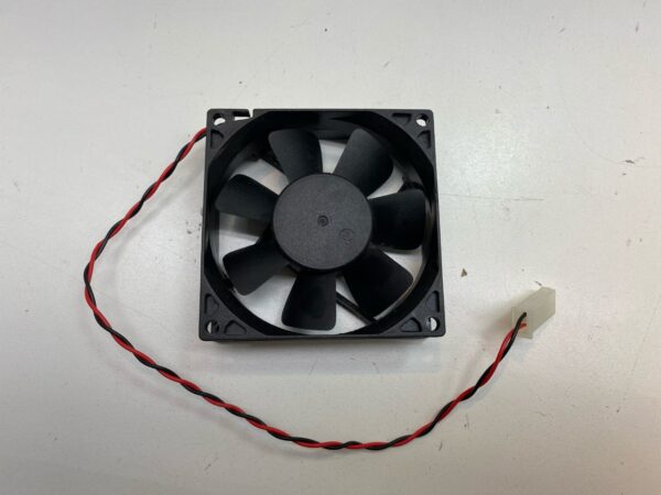 A small 12V x .25A Cooling Fan. Orion Fans Part OD8025-12HSS. GETT Part Fan263 on a white surface.