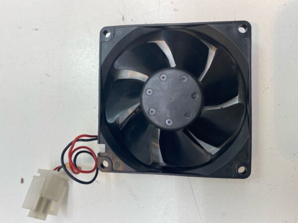 A .12V x .30A Cooling Fan on a white surface.