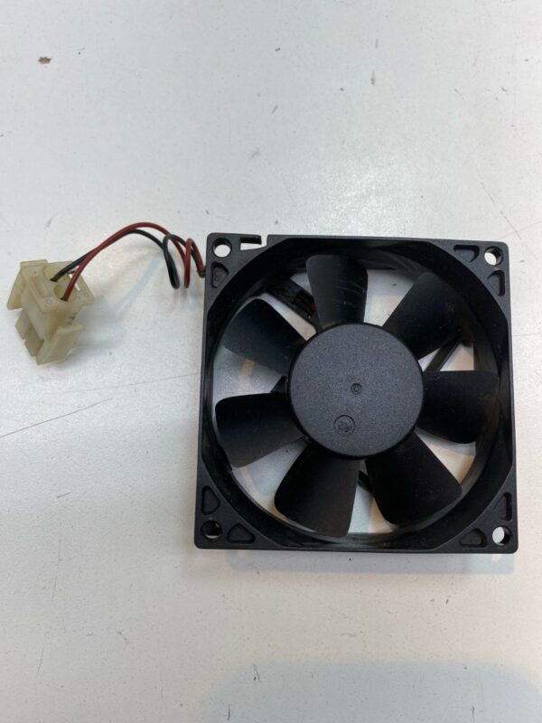 A Qualtek 12V x .25A Cooling Fan, Qualtek Fan Part FAD1-08025CBHW11, on a white surface.