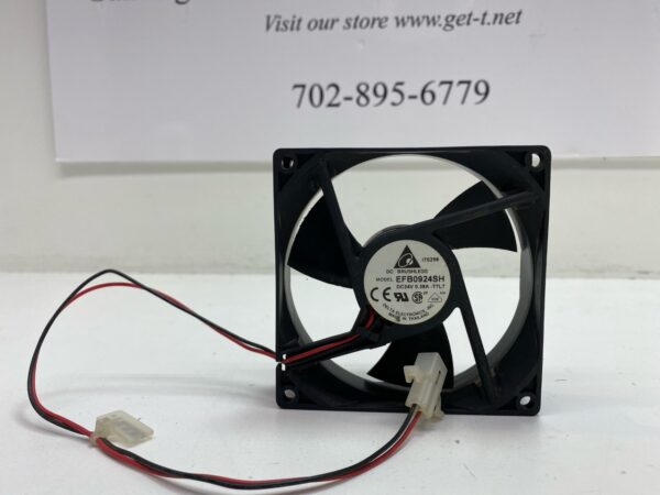 A small 24V x .38A Cooling Fan with wires on it.