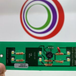 A person is holding up a card with the Kiesub Electronics K624-DP LED Replacement Board for Display Panel on Bally 6000 circular logo on it.