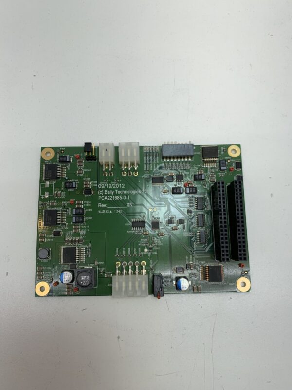 A Power Control Board Assembly for Bally Alpha I, Bally Part PCA221685-0-1 GETT Part PCBA114, on a white surface.